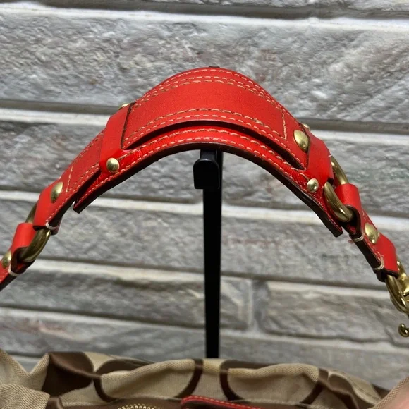 Coach Carly Signature Hobo Bag with red leather trim and gold-tone hardware. - Picture 8 of 14